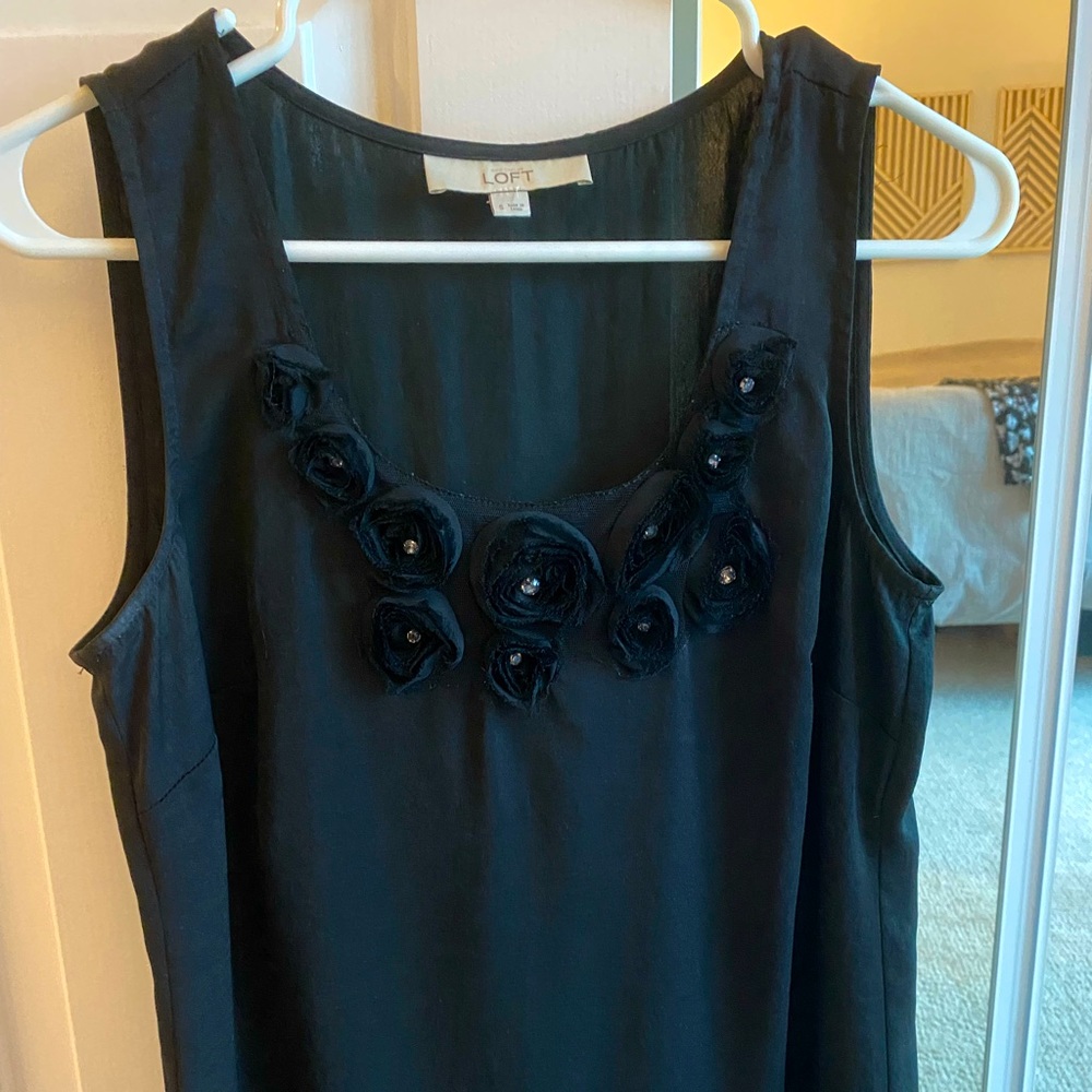 Sleeveless black Loft blouse with flower detail Size S